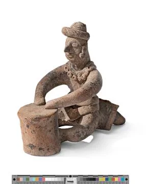 Small Drummer leaning against Reclinatorio. Mexico, Colima, 200 BCE500 CE. .. Stock Photos