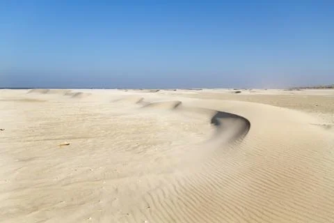 Small dunes on beach Stock Photos