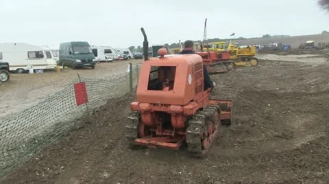 Small earth moving tractor 11 Stock Footage 20466574