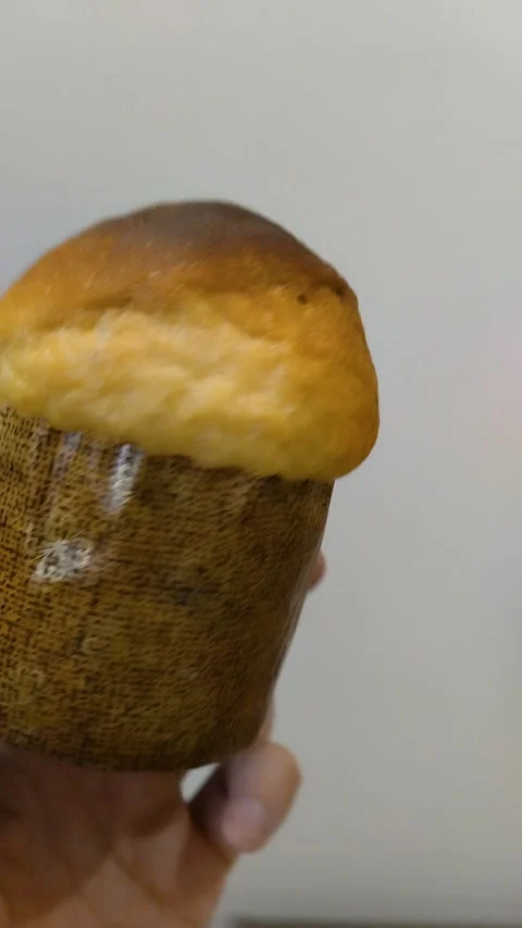 Small Easter bread in hand Stock Footage 318160327