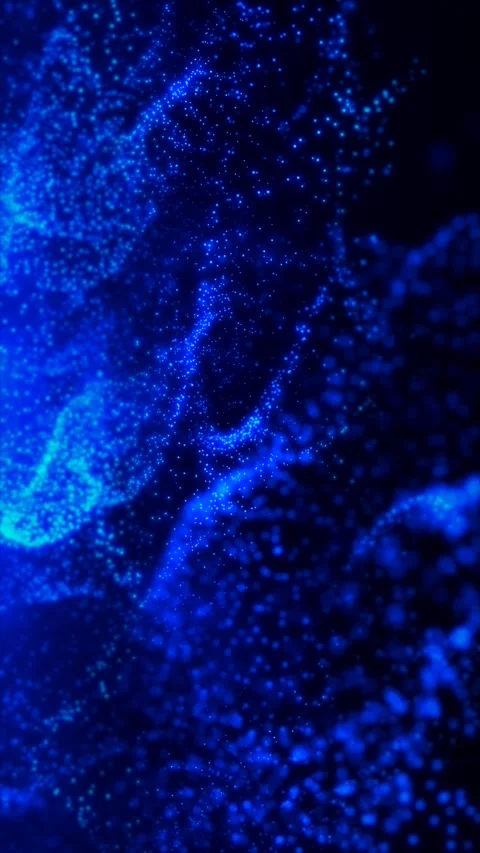 Small electric blue lights sparkle and float against a dark Stock Footage 329297445