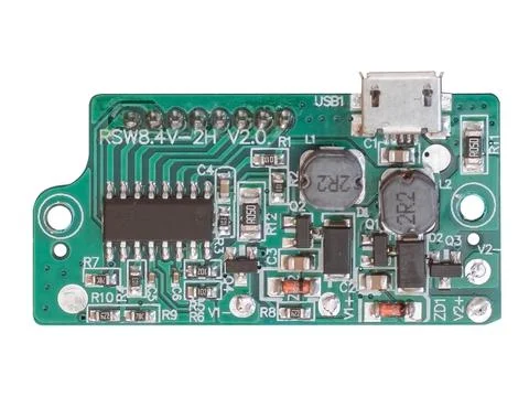 Small electric board for camera battery charging with micro usb port isolated Stock Photos