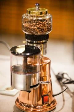 Small electric coffee machine. Kitchen household cooking appliance Stock Photos