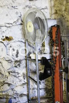 Small electric fan in white exterior Stock Photos