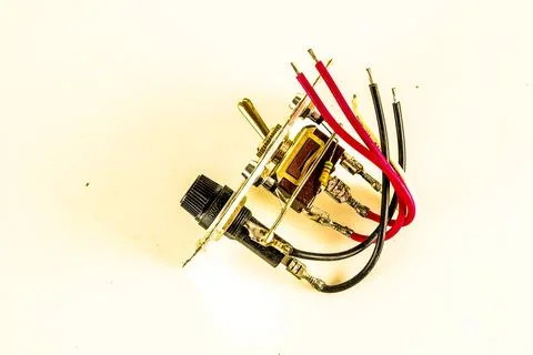 A small electronic device with wires attached to it Foto stock
