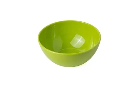 Small empty bright green ceramic bowl isolated on a plain white background Stock Photos