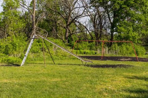 Small empty children's playground Stock Photos