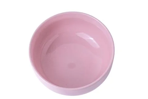 Small empty light purple ceramic bowl isolated on a plain white background Stock Photos