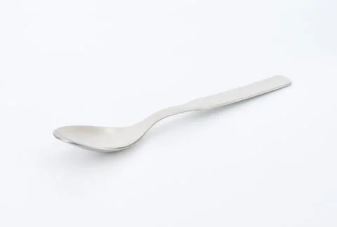 Small empty spoon Stock Photos