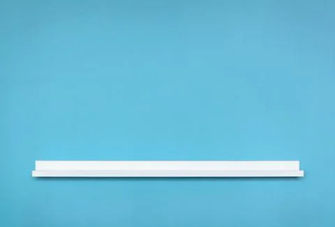 Small empty white shelf  on wall. Foto stock