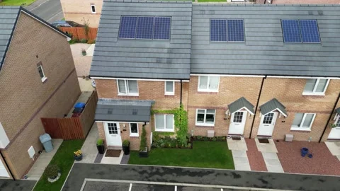Small Energy-Efficient British Home: Aerial View of New Build Terrace House, 4K Stock Footage 257971362