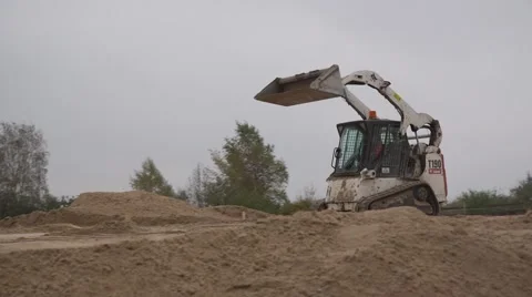 Small excavator Bobcat Stock Footage 42615498