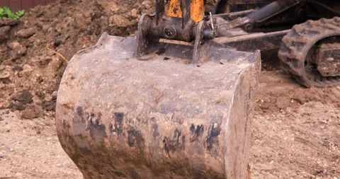 Small excavator working on a construction site. Construction works. Stock Footage 152506343