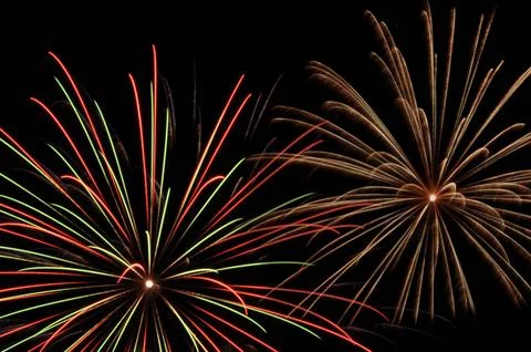 Small explosions of fireworks in the sky Stock Photos