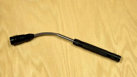 Small extendable flashlight 库存照片