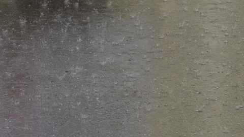 Small falling and jumping hail on the roadway near the car Stock Footage 126826414