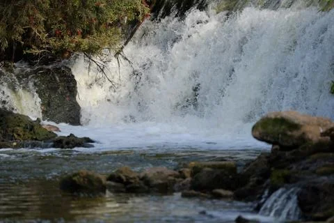 Small falls at the river Stock Photos