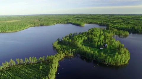 Small farm house located in a small scenic cape at a lake in Finland. Stock Footage 83306867