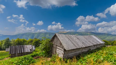 Small farm on a mountain slope Stock Footage 340885661