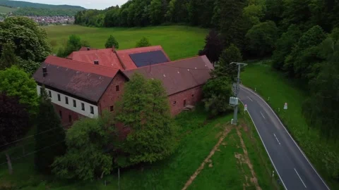 Small farm by the road with forest Stock Footage 154757501