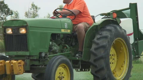 Small farm tractor close up sequence Stock Footage 985080