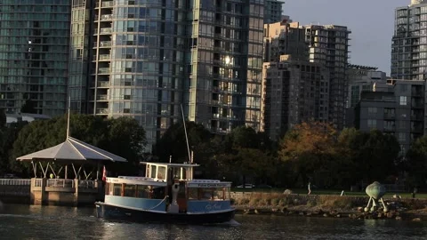 Small Ferry (Aquabus)  in False Creek Vancouver Video stock 142899506