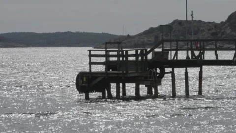 Small Ferry Boat terminal at Bohuslan archipelago, Sweden Stock Footage 344296969