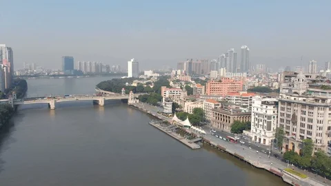 A small ferry pier on the river, a bridge connecting two banks. Intensive Stock Footage 118150408