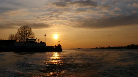 Small ferry sailing during sunset. Stock Footage 64205180