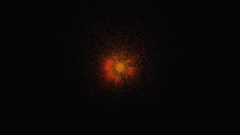 Small fiery explosion blooming with embers against a dark background cinema.. Video stock 343481892