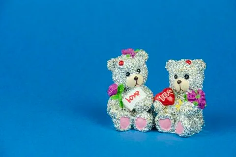 Small figures of bears with hearts. Stock Photos