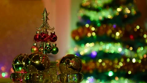 A small fir tree rotates among the New Year's balls Stock Footage 258331856