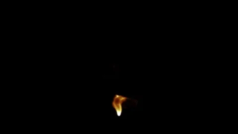 Small Fire Burning 0-1 Black Background 4K Stock Footage 244751061