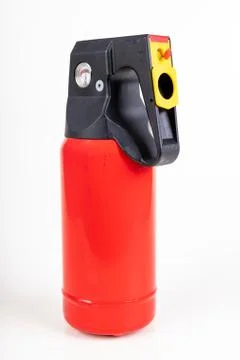 A small fire extinguisher to extinguish a fire in passenger cars. Fire access Stock Photos