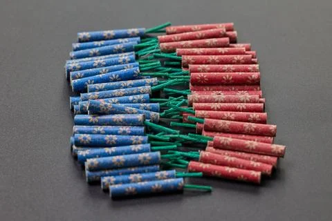 Small firecrackers on a black background Stock Photos