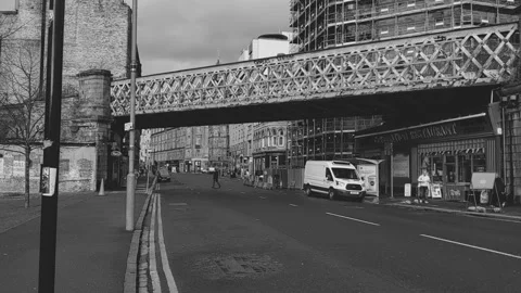 A small fish and chips shop under a railway bridge in the city Stock Footage 171835576