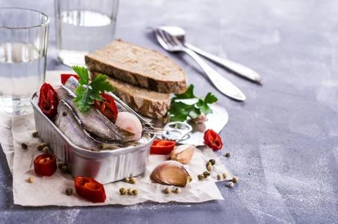 Small fish in brine Stock Photos