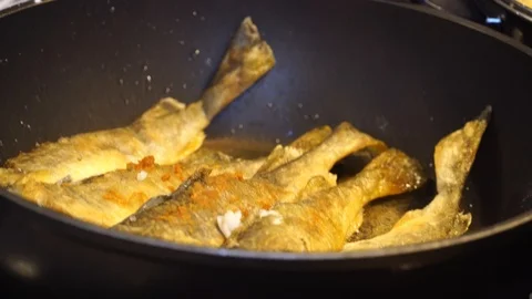 Small fish fried in a pan Stock Footage 125009801