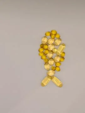 A small fish on a white background consists of omega-3 capsules close-up Stock Photos