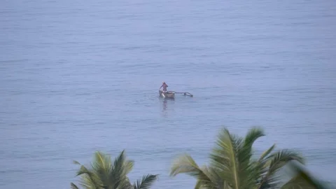 Small-fishing-boat-casting-net-agonda-goa-india Stock Footage 331229850