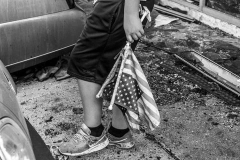 Small flags in hand Stock Photos