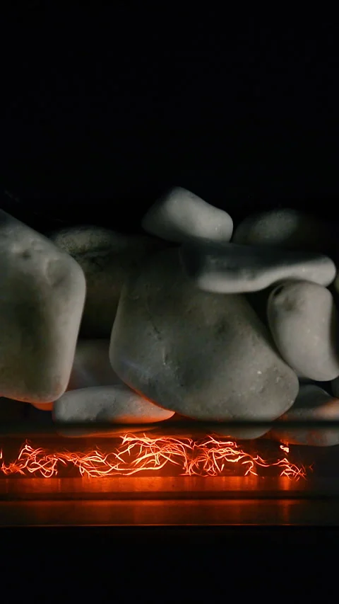 A small flame when lighting a fireplace. Vertical video. Stock Footage 325173276