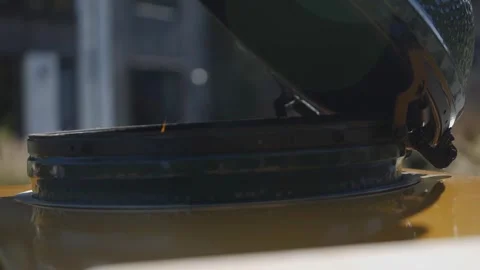 Small flames dance gracefully within an open barbecue grill Stock Footage 247054562