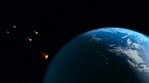 Small flaming asteroids move against the earth Video stock 40336579