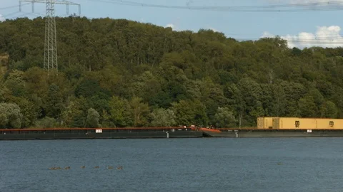 Small flatbed container ship Stock Footage 104842399