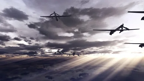 Small Fleet of Military Attack Drones in Dramatic Cloudscape with Light Stock Footage 220698904