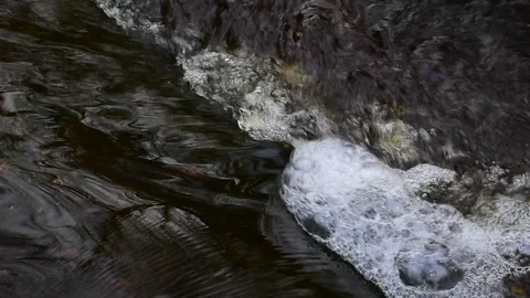Small flow of water,  top view Stock Footage 119174902