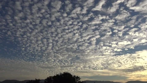 Small fluffly clouds timelapse Stock Footage 159075498