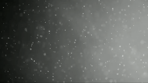 The small flying particles in emptiness. Stock Footage 100799292