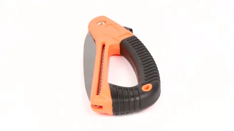 Small fold hand-saw for tree pruning. Folding-saw work tool on white background. Stock Footage 156614933